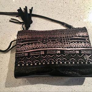 The Sak Black shoulder strap purse